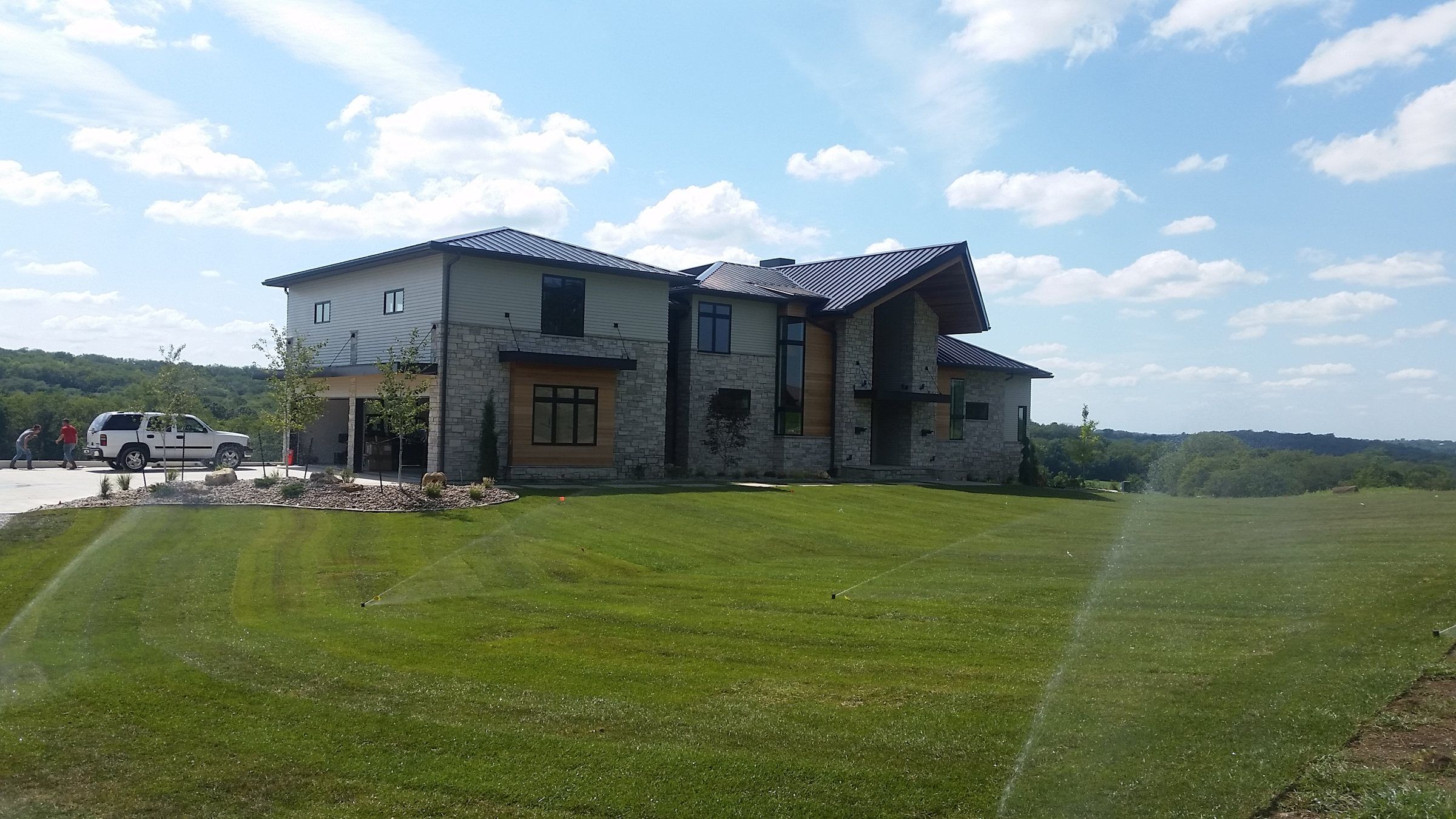 Large custom home built by JFE Construction on rolling acreage