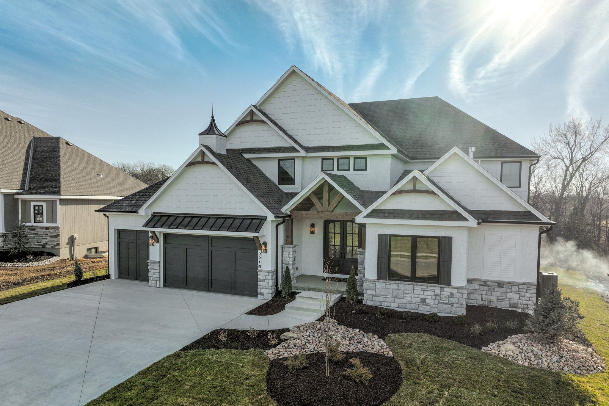 Front exterior of the JFE Construction Maplewood III plan