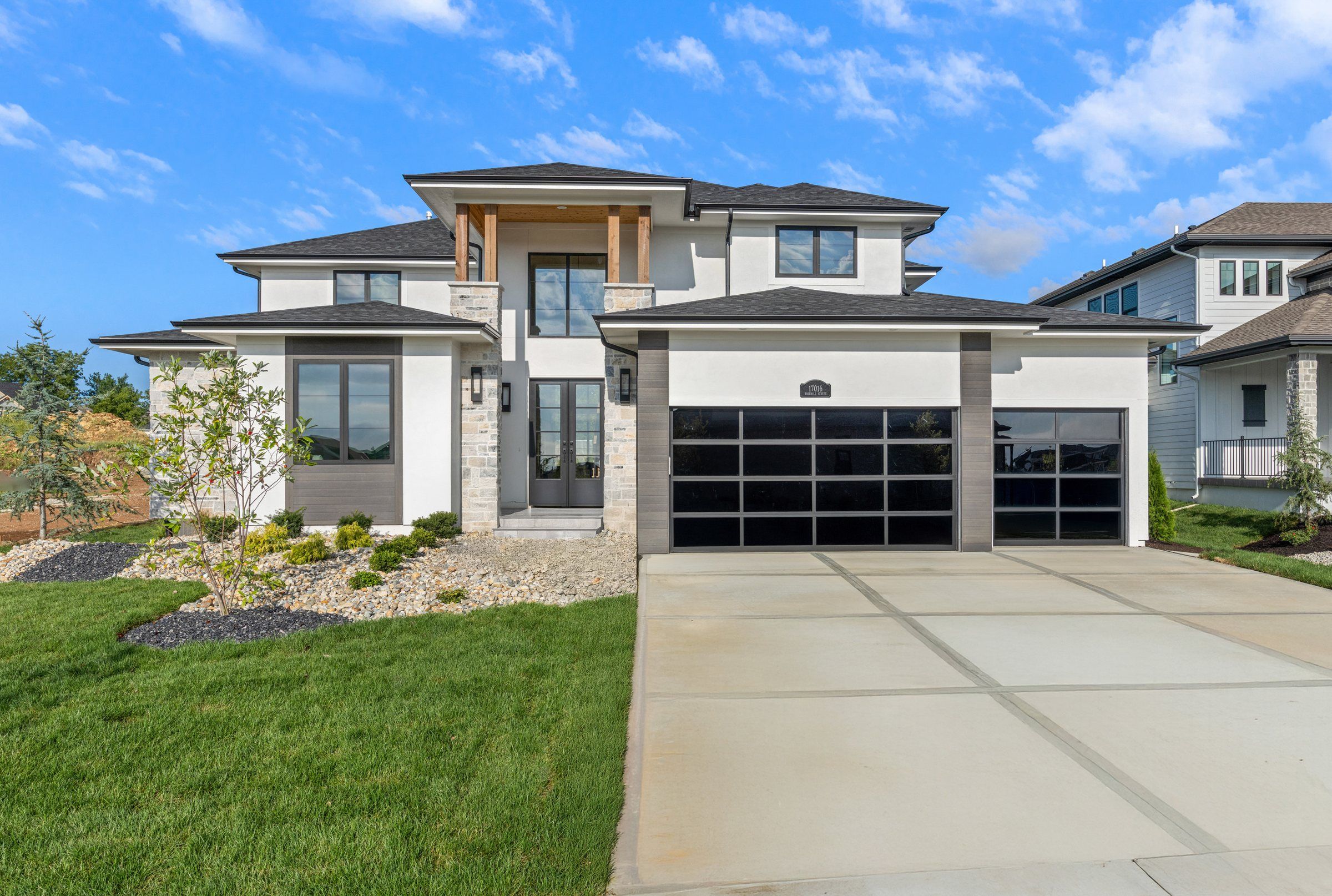 Modern two-story Maplewood IV model home by JFE Construction in Century Farms, Overland Park